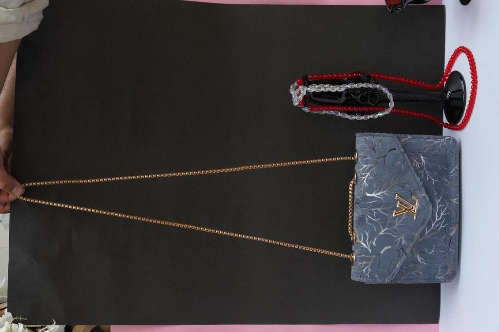 Woman's velvet Textured purse with chain